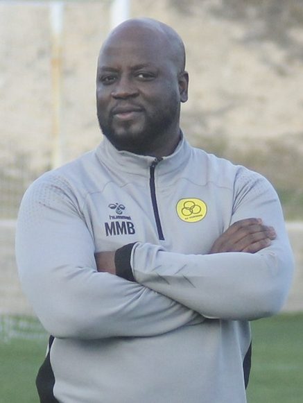 Mattar M'Boge coaching pitchside